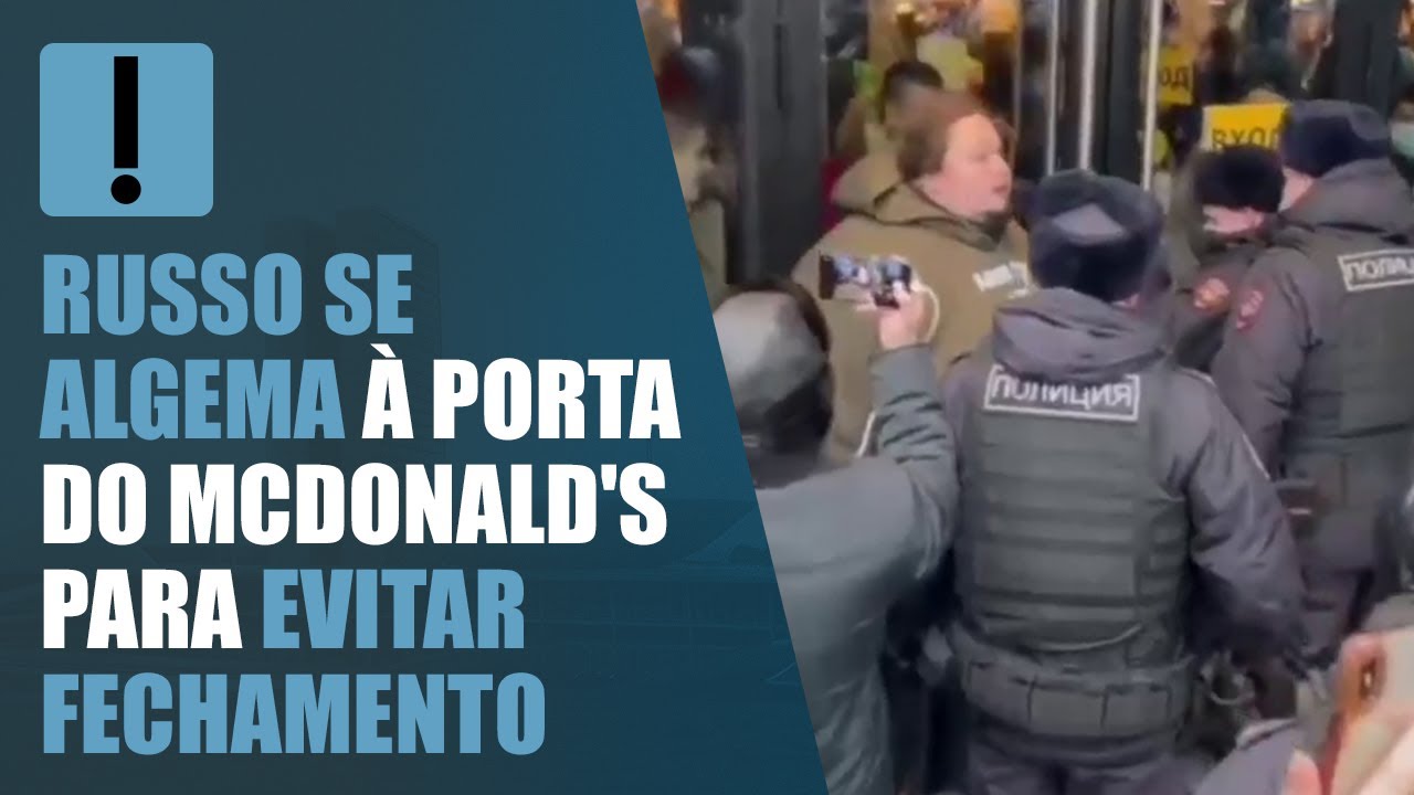 Russo se algema à porta do McDonald's para evitar fechamento