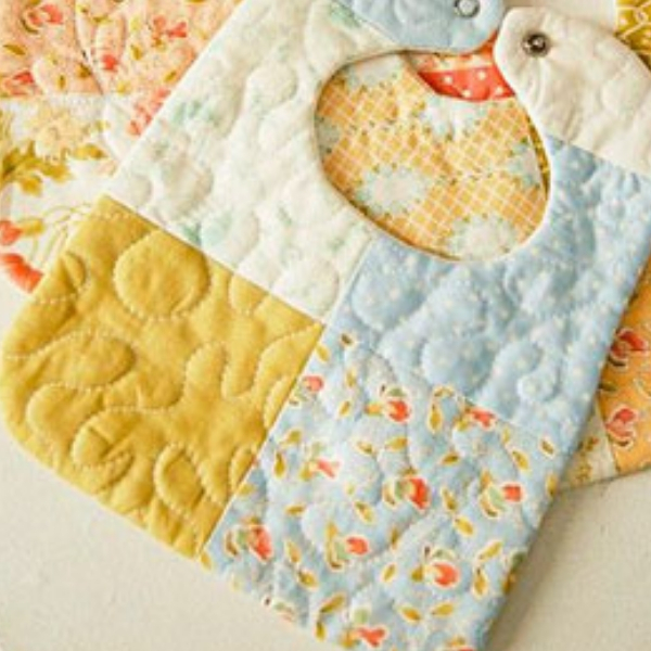 fazer decoração com patchwork babador