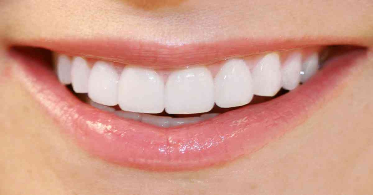 Como clarear os dentes com vinagre de maçã