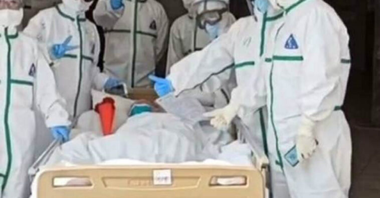 mulher mais velha a se recurar do covid 19