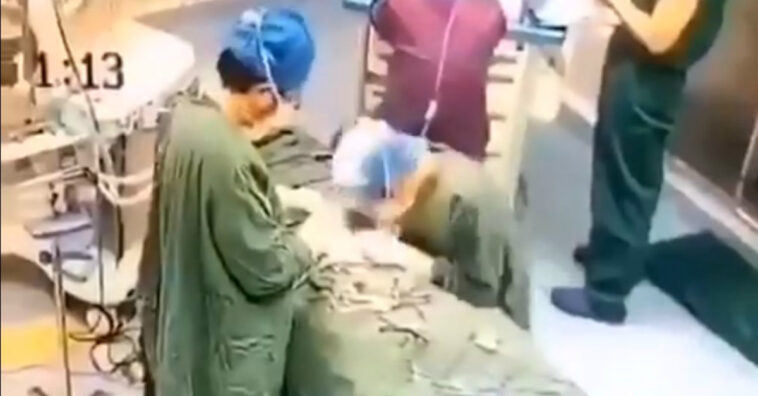 médico chinês desmaia operando paciente com coronavírus